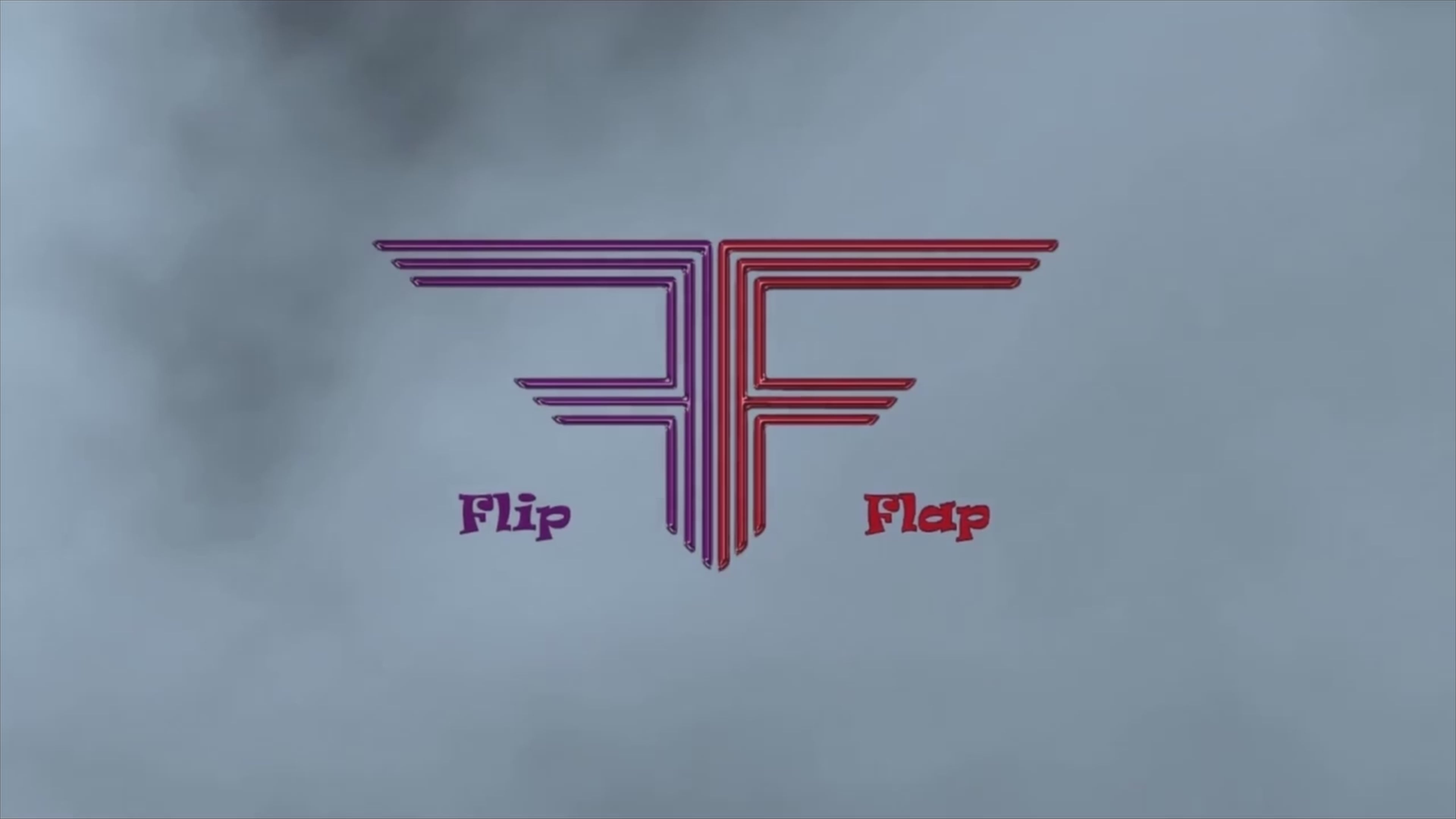 Load video: Flip Flap rotating with her uses in flashing text.